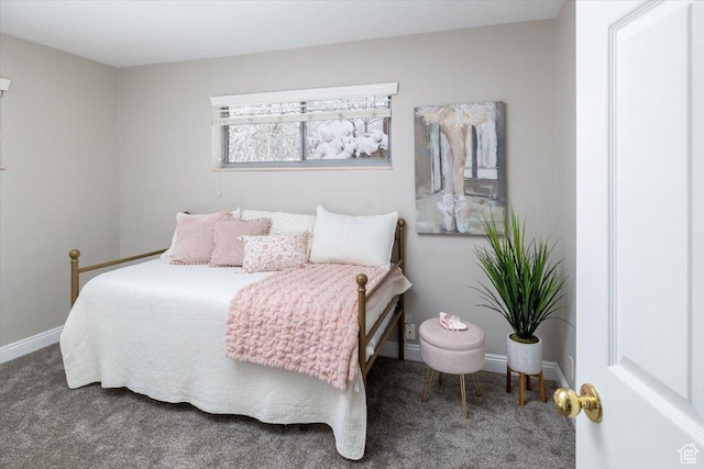 bedroom with carpet flooring and baseboards