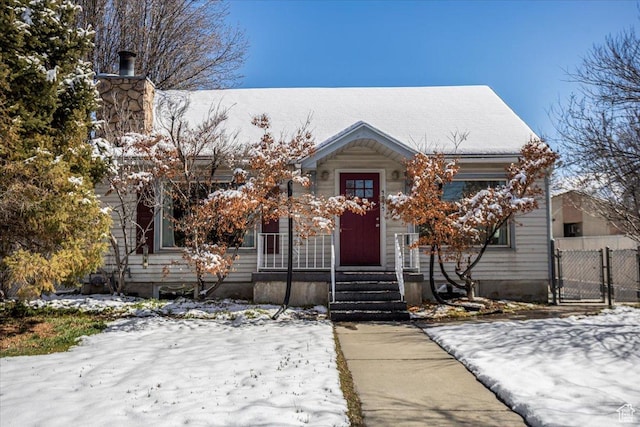 view of front of house with fence