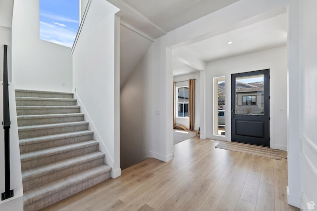 4784 W Juniper Bend Cir, Herriman, UT 84096 - entryway featuring stairway, recessed lighting, light wood-style floors, and baseboards