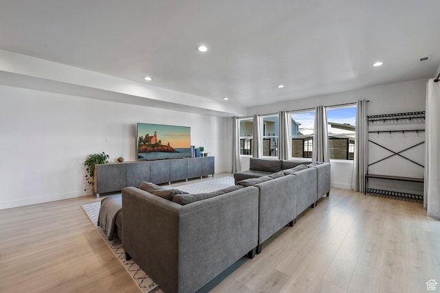 4784 W Juniper Bend Cir, Herriman, UT 84096 - living area with recessed lighting, visible vents, baseboards, and light wood finished floors