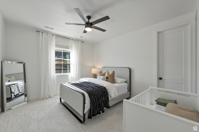 4784 W Juniper Bend Cir, Herriman, UT 84096 - bedroom with ceiling fan, baseboards, visible vents, and light carpet