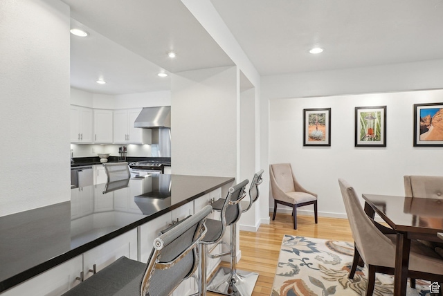 71 W Apricot Ave, Salt Lake City, UT 84103 - dining room with light wood finished floors, recessed lighting, and baseboards