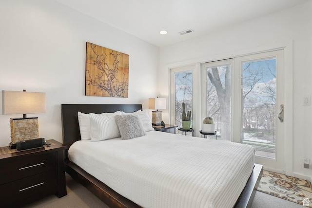 71 W Apricot Ave, Salt Lake City, UT 84103 - carpeted bedroom featuring recessed lighting, visible vents, multiple windows, and access to exterior
