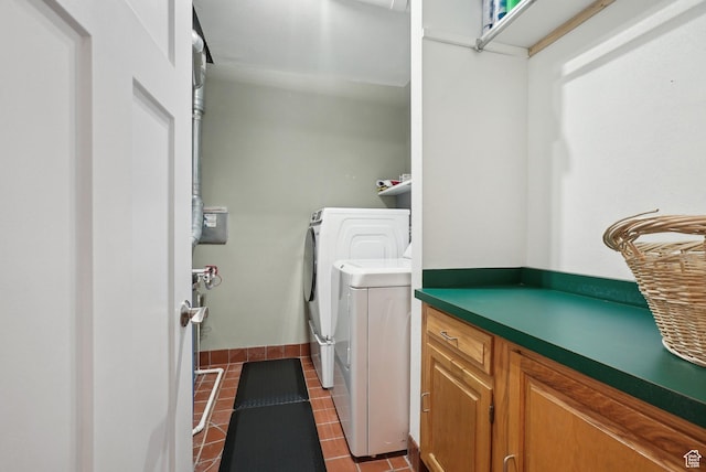 71 W Apricot Ave, Salt Lake City, UT 84103 - clothes washing area featuring laundry area, dark tile patterned flooring, and washing machine and dryer