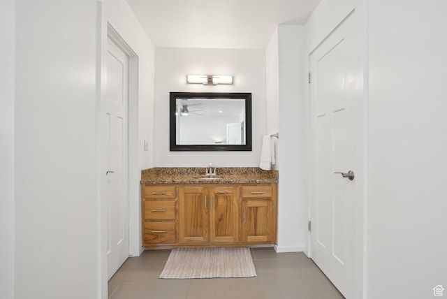71 W Apricot Ave, Salt Lake City, UT 84103 - bathroom with a ceiling fan, vanity, and tile patterned flooring
