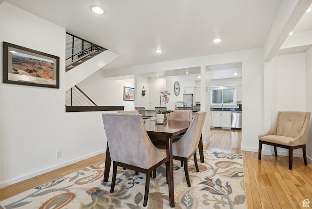 71 W Apricot Ave, Salt Lake City, UT 84103 - dining room featuring recessed lighting, light wood-style flooring, stairway, and baseboards