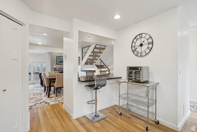 71 W Apricot Ave, Salt Lake City, UT 84103 - corridor featuring recessed lighting, baseboards, light wood-style flooring, and stairs
