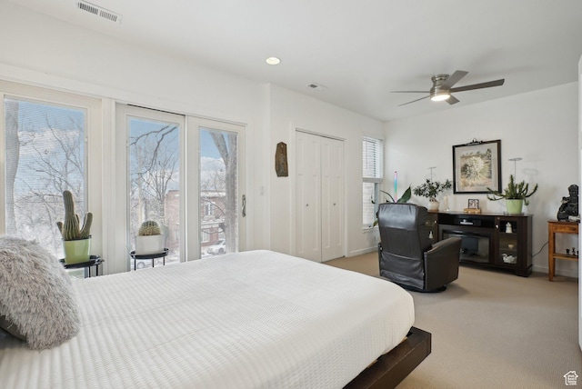 71 W Apricot Ave, Salt Lake City, UT 84103 - bedroom with visible vents, multiple windows, light carpet, and access to exterior