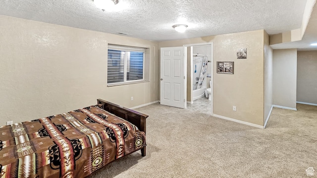 135 E 1200 N, Mapleton, UT 84664 - carpeted bedroom featuring baseboards, ensuite bath, a textured wall, and a textured ceiling