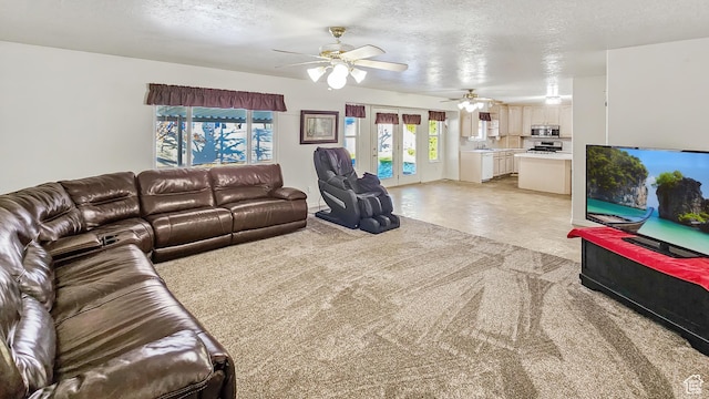 135 E 1200 N, Mapleton, UT 84664 - living room with french doors, a ceiling fan, light colored carpet, and a textured ceiling
