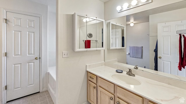 135 E 1200 N, Mapleton, UT 84664 - bathroom with tile patterned floors, vanity, and a bathtub