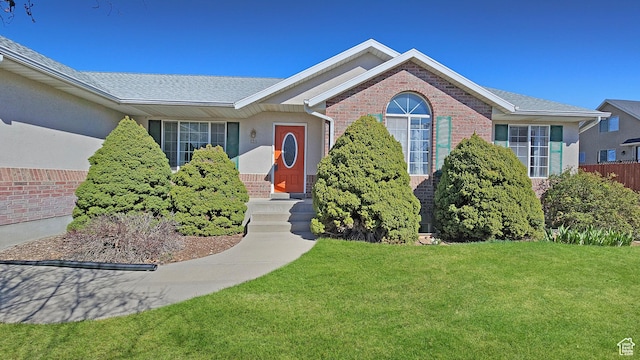 135 E 1200 N, Mapleton, UT 84664 - single story home with brick siding and a front lawn