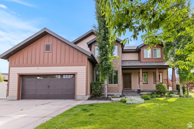 5927 Dartmouth Dr, Mountain Green, UT 84050 - craftsman inspired home with board and batten siding, driveway, a front lawn, a garage, and a porch
