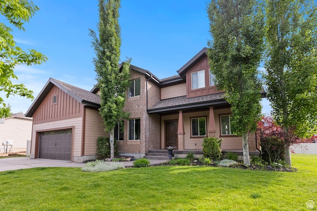 5927 Dartmouth Dr, Mountain Green, UT 84050 - view of front of house with driveway, board and batten siding, a front yard, an attached garage, and a porch