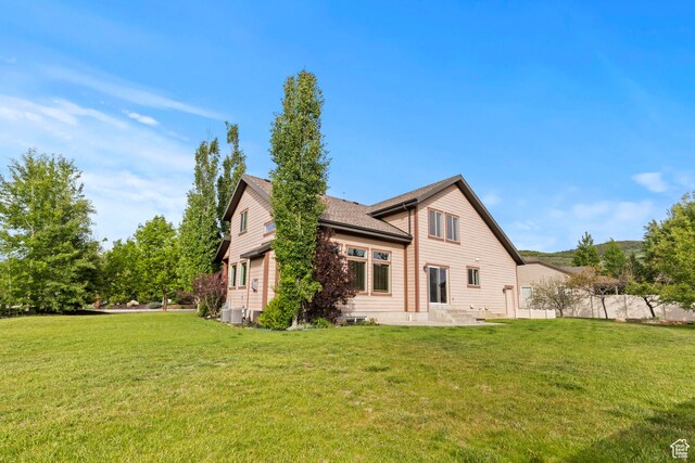 5927 Dartmouth Dr, Mountain Green, UT 84050 - back of house with central AC unit and a patio area