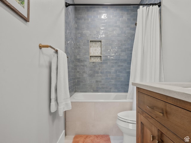 5927 Dartmouth Dr, Mountain Green, UT 84050 - full bathroom featuring shower / tub combo, toilet, vanity, baseboards, and tile patterned flooring