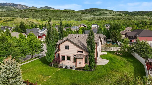 5927 Dartmouth Dr, Mountain Green, UT 84050 - aerial perspective of suburban area featuring a mountainous background