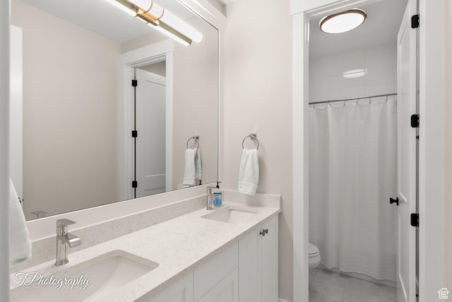 2092 S 3010 E, St George, UT 84790 - full bathroom with double vanity, tile patterned floors, toilet, and a sink