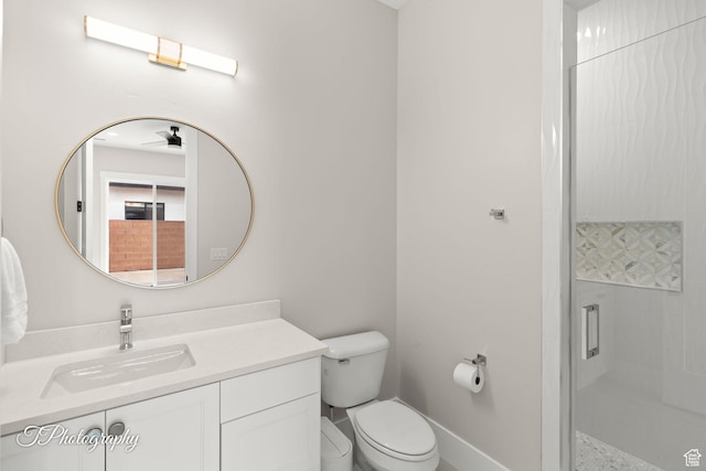 2092 S 3010 E, St George, UT 84790 - bathroom featuring vanity, toilet, and a stall shower