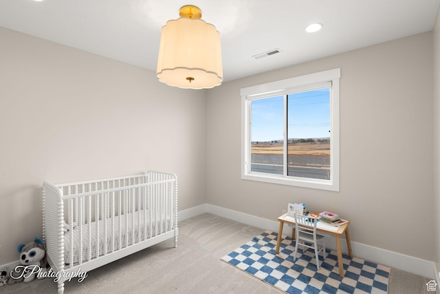 2092 S 3010 E, St George, UT 84790 - carpeted bedroom featuring recessed lighting, visible vents, baseboards, and a crib