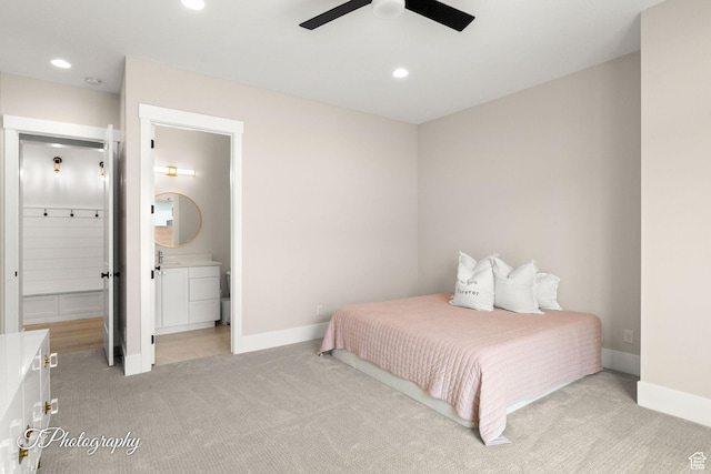 2092 S 3010 E, St George, UT 84790 - bedroom featuring light carpet, a ceiling fan, recessed lighting, connected bathroom, and baseboards