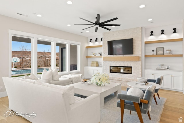2092 S 3010 E, St George, UT 84790 - living room featuring recessed lighting, a ceiling fan, visible vents, and light wood finished floors