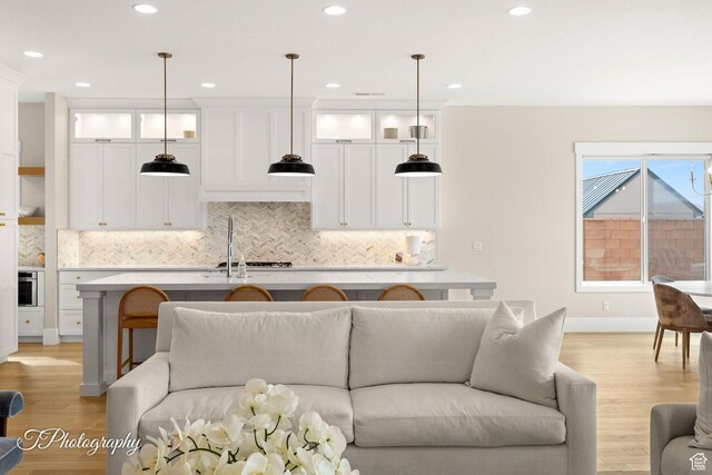 2092 S 3010 E, St George, UT 84790 - living area with recessed lighting, light wood-type flooring, and baseboards