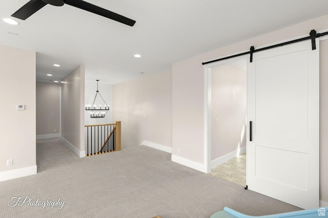 2092 S 3010 E, St George, UT 84790 - interior space featuring recessed lighting, ceiling fan with notable chandelier, light colored carpet, and a barn door