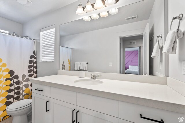 373 S 850 E, American Fork, UT 84003 - bathroom with vanity, ensuite bath, toilet, and visible vents