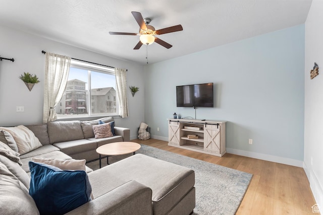 373 S 850 E, American Fork, UT 84003 - living area with baseboards, light wood-style floors, and a ceiling fan
