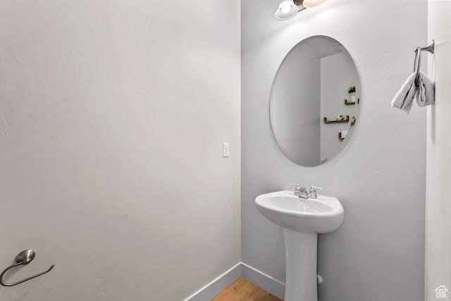 373 S 850 E, American Fork, UT 84003 - bathroom featuring wood finished floors, baseboards, and a sink