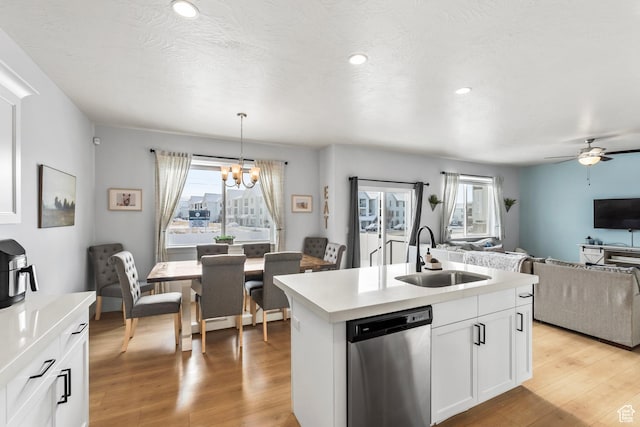 373 S 850 E, American Fork, UT 84003 - kitchen with a sink, light wood-style floors, stainless steel dishwasher, and open floor plan