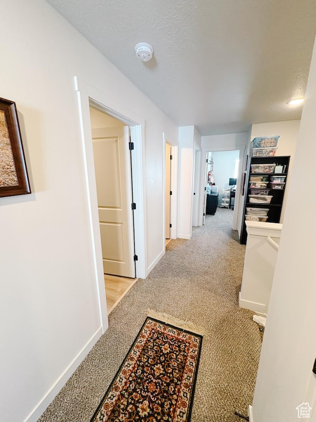 1788 N 1280 E, Payson, UT 84651 - hallway with a textured ceiling, baseboards, and carpet floors