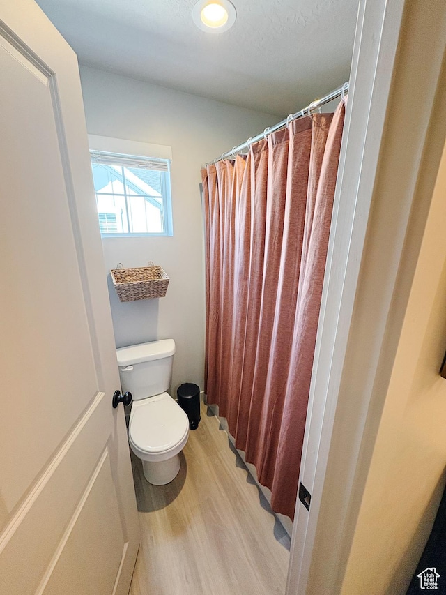 1788 N 1280 E, Payson, UT 84651 - bathroom with a shower with shower curtain, toilet, and wood finished floors