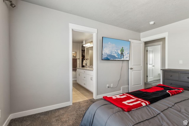 280 S 675 W, Centerville, UT 84014 - bedroom featuring light colored carpet, ensuite bath, and light tile patterned floors