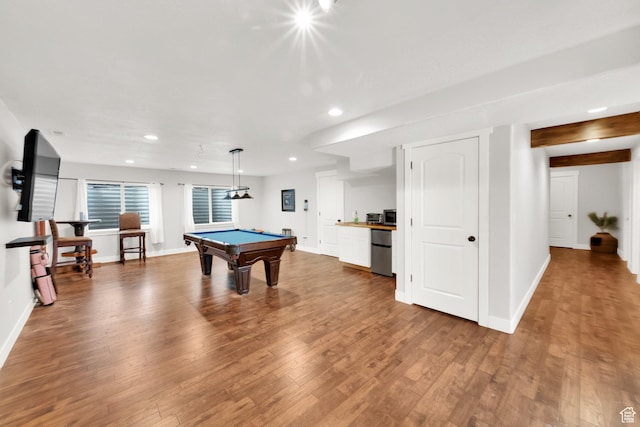 game room with recessed lighting, wood finished floors, and baseboards