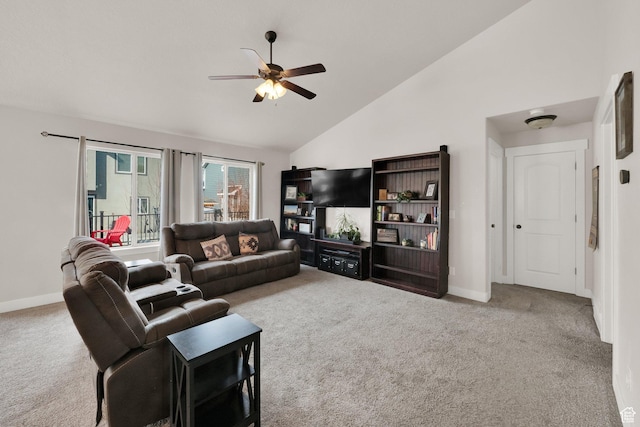 carpeted living area featuring baseboards, high vaulted ceiling, and ceiling fan