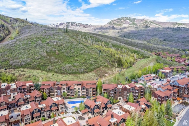 bird's eye view with a mountain view