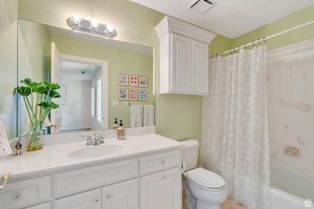 bathroom with vanity, shower / tub combo, toilet, and visible vents