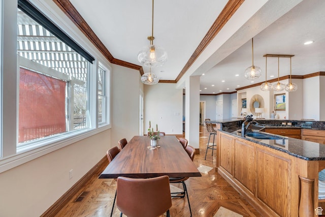 dining area with crown molding, recessed lighting, baseboards, and visible vents
