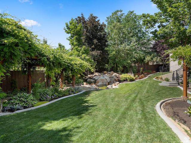 view of yard with fence