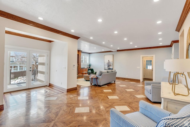 living room with recessed lighting, french doors, baseboards, and crown molding