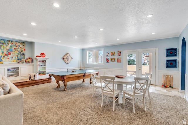 game room with recessed lighting, wainscoting, french doors, and ornamental molding