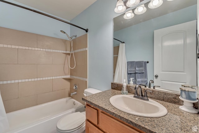 full bathroom featuring vanity, toilet, and shower / tub combo