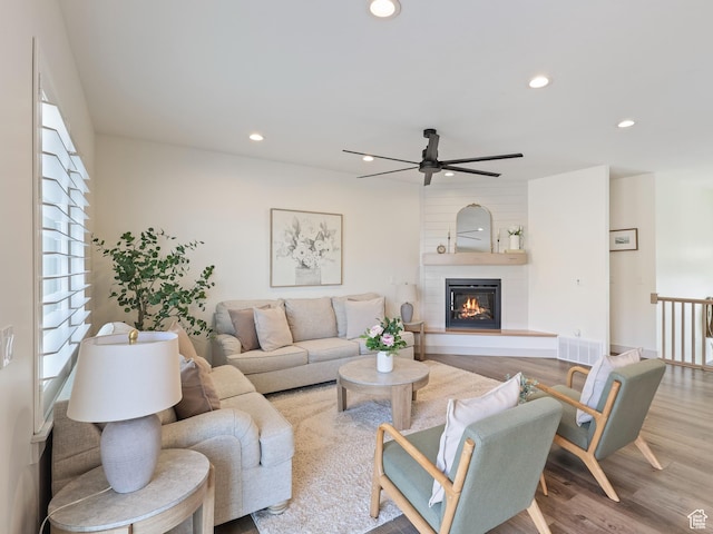14653 S Annika Run Dr Unit 17, Herriman, UT 84096 - living room with recessed lighting, wood finished floors, a fireplace, and ceiling fan