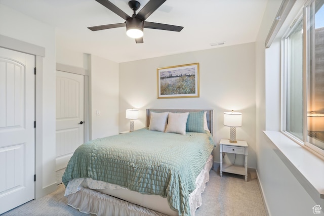 14653 S Annika Run Dr Unit 17, Herriman, UT 84096 - carpeted bedroom with visible vents, baseboards, and a ceiling fan