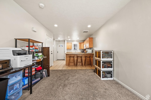 422 N Hodges Ln, Salt Lake City, UT 84116 - interior space featuring visible vents, recessed lighting, light tile patterned floors, baseboards, and light colored carpet