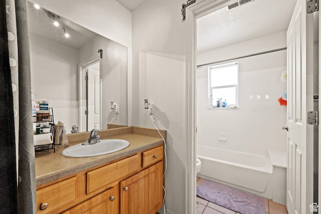 422 N Hodges Ln, Salt Lake City, UT 84116 - bathroom with vanity, visible vents, shower / washtub combination, tile patterned floors, and toilet
