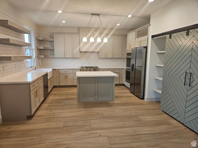 kitchen featuring open shelves, stainless steel appliances, recessed lighting, backsplash, and light countertops