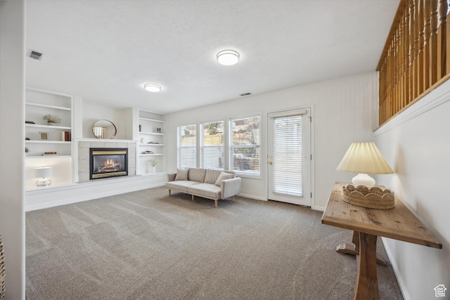 696 W 1275 N, Farmington, UT 84025 - living area with carpet flooring, a fireplace, baseboards, and built in shelves
